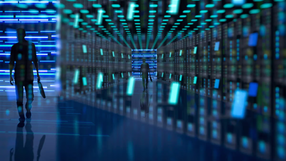 Man walking through server room